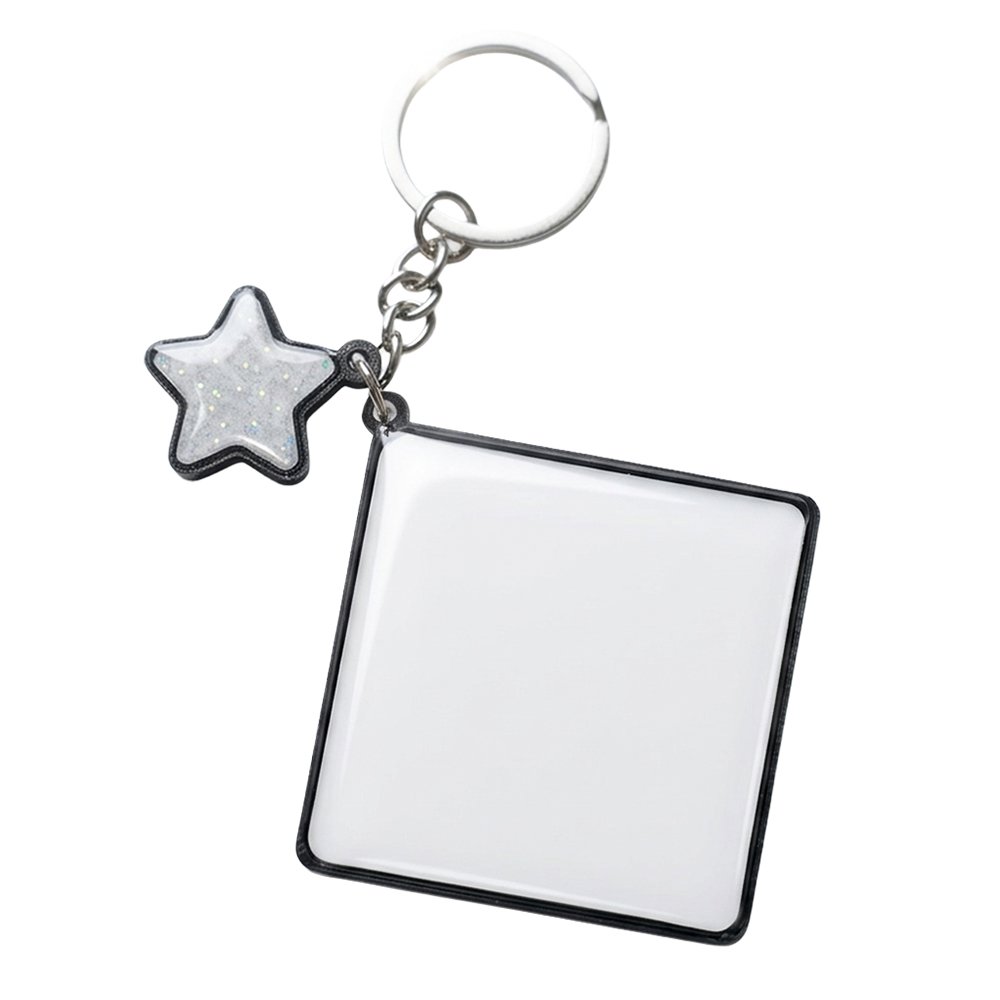 Base de llavero cuadrado blanco para personalizar, con marco negro impreso en 3D, recubrimiento de resina brillante y dije de estrella con glitter plateado.